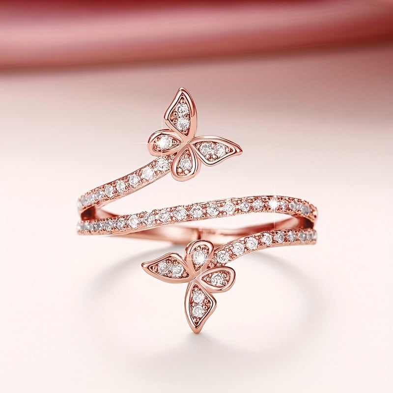 Butterfly-Embellished White Gold Ring with Zirconia Inlays