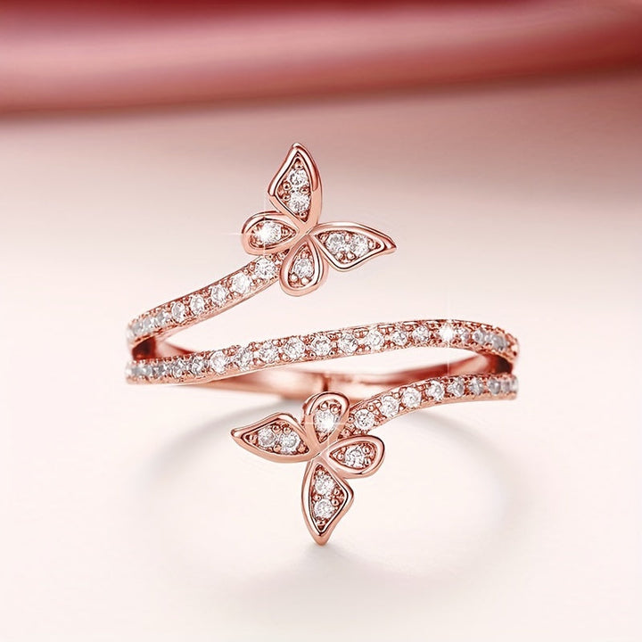 Butterfly-Embellished White Gold Ring with Zirconia Inlays
