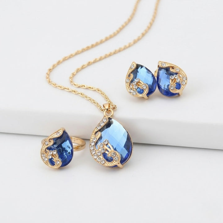 Gold Necklace and Earring Set with Blue Crystals