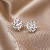 Snowflake Earrings in White Gold