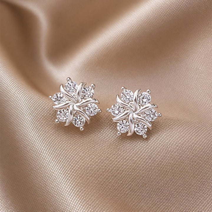 Snowflake Earrings in White Gold