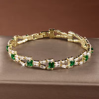 Viora™ - Emerald Tennis Bracelet with Gold Accents