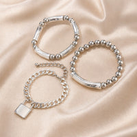 Set of White Gold Beaded Bracelets with Punk Lock Design