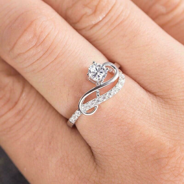Moissanite Infinity Swirl Wave Ring in White Gold