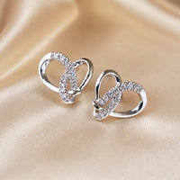 Geometric Stud Earrings in White Gold with Zirconia