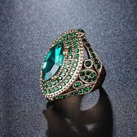 Magenta™ - Gold Emerald Regent Ring