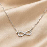 White Gold Infinity Symbol Pendant Necklace with Zirconia