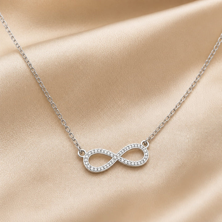 White Gold Infinity Symbol Pendant Necklace with Zirconia