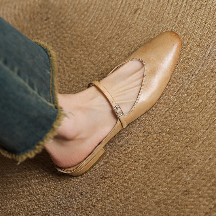 Buckle strap detail on a Mary-Jane leather mule
