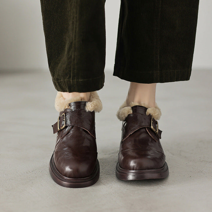 Regent Black leather oxford heel, side view of mid heel