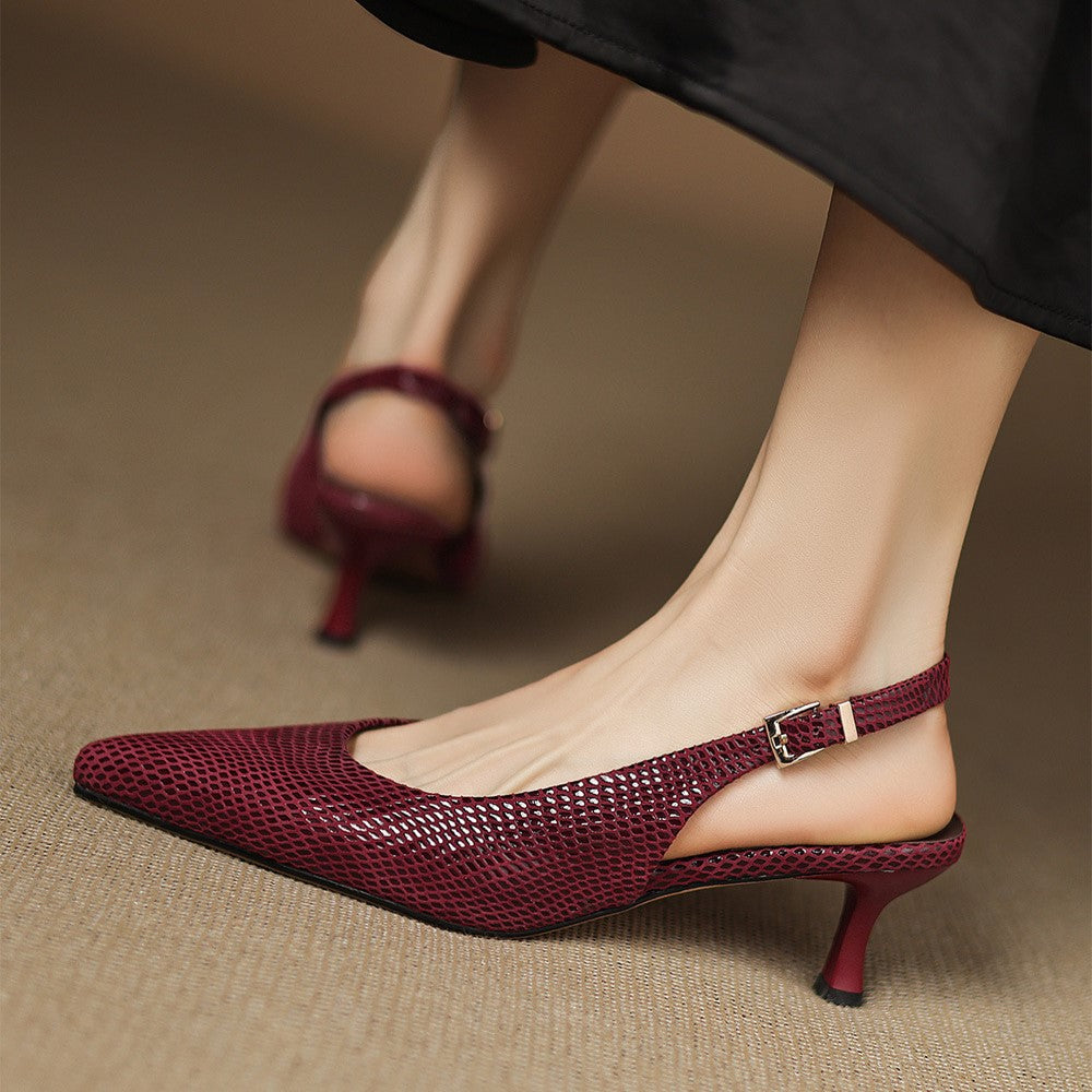 Onyx Black pointed leather slingback heel, side view of slender 2-inch heel