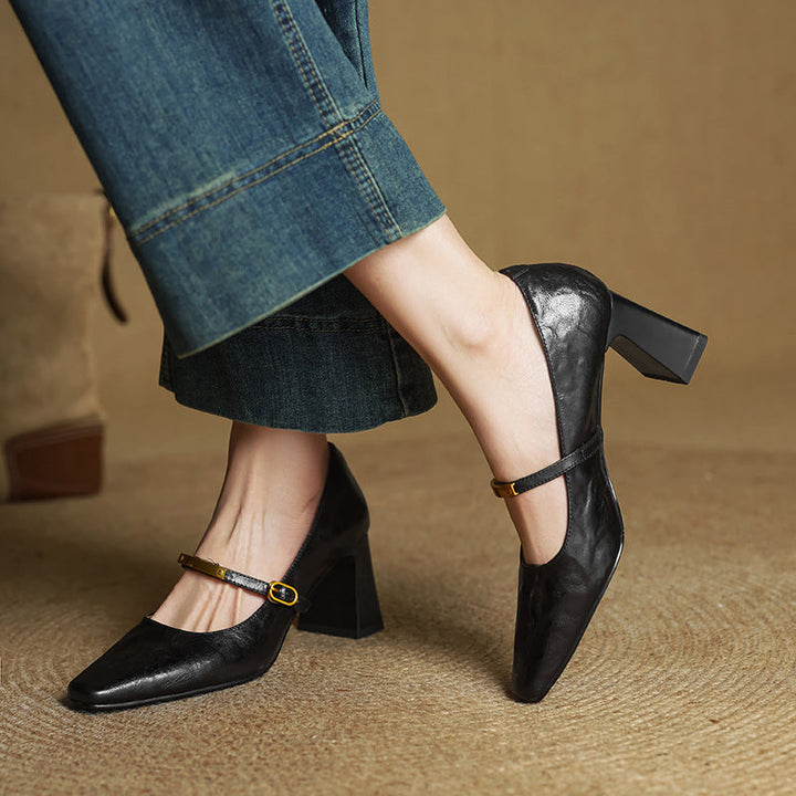 Espresso Brown leather block pump, side view of 2.75-inch block heel