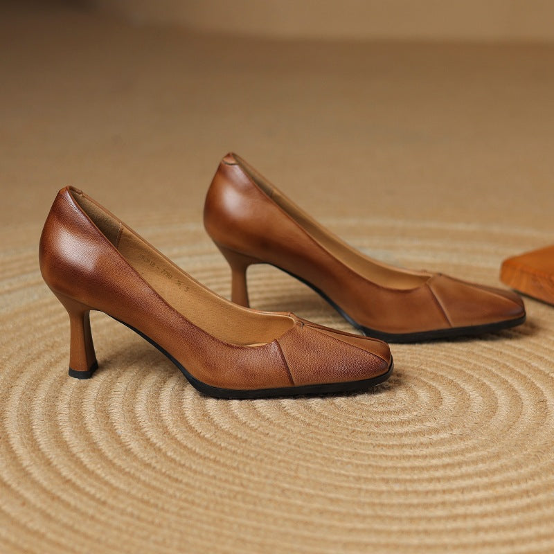 Pleated square-toe leather pumps, top view of Cognac pair
