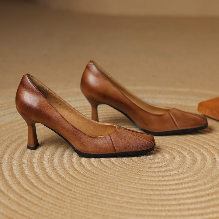 Pleated square-toe leather pumps, top view of Cognac pair
