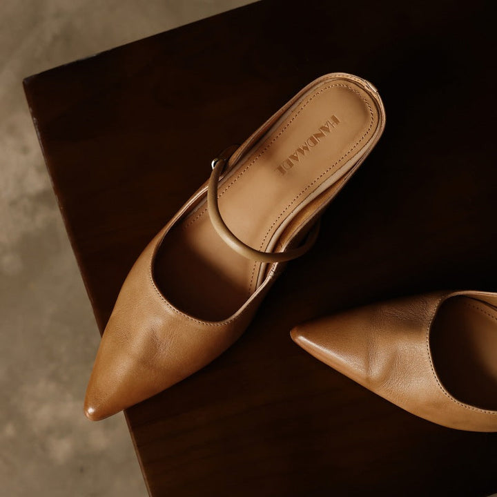 Top-down view of a pointed-toe leather mule