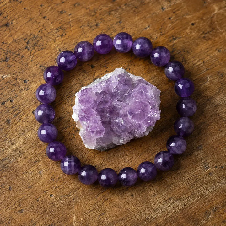 Close-up of natural purple amethyst gemstone healing beads