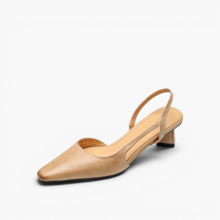Women's leather slingback pumps with open sides, side profile