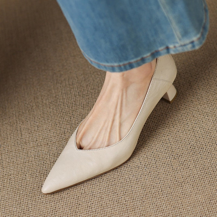 Maureen pumps worn with tailored separates