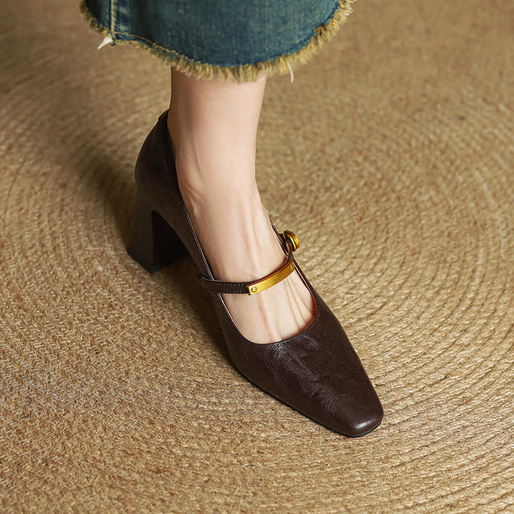 Close-up of block heel on Bridget leather pumps