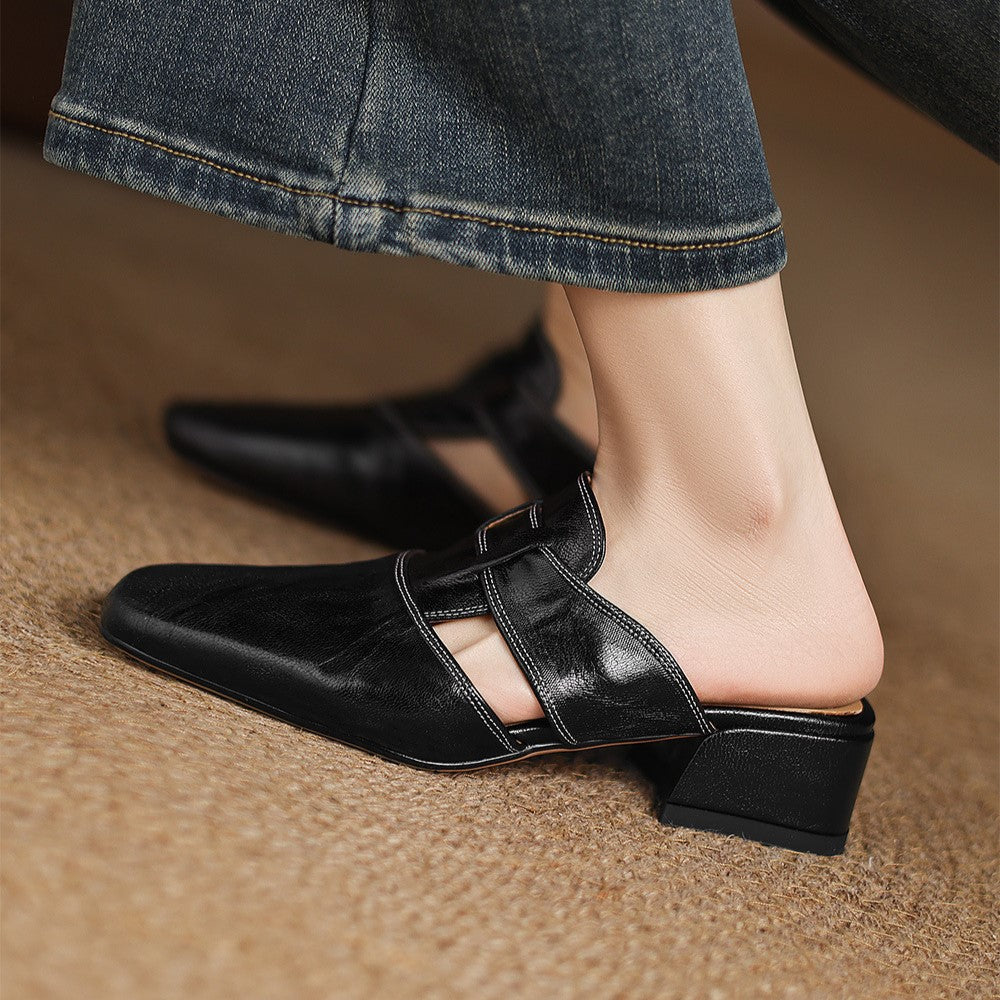 Close-up of lambskin leather on a square-toe mule