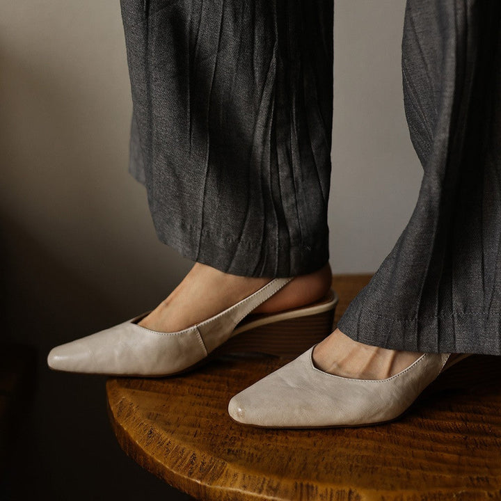 Soft Oat lambskin wedge slingback with rounded toe, three-quarter view