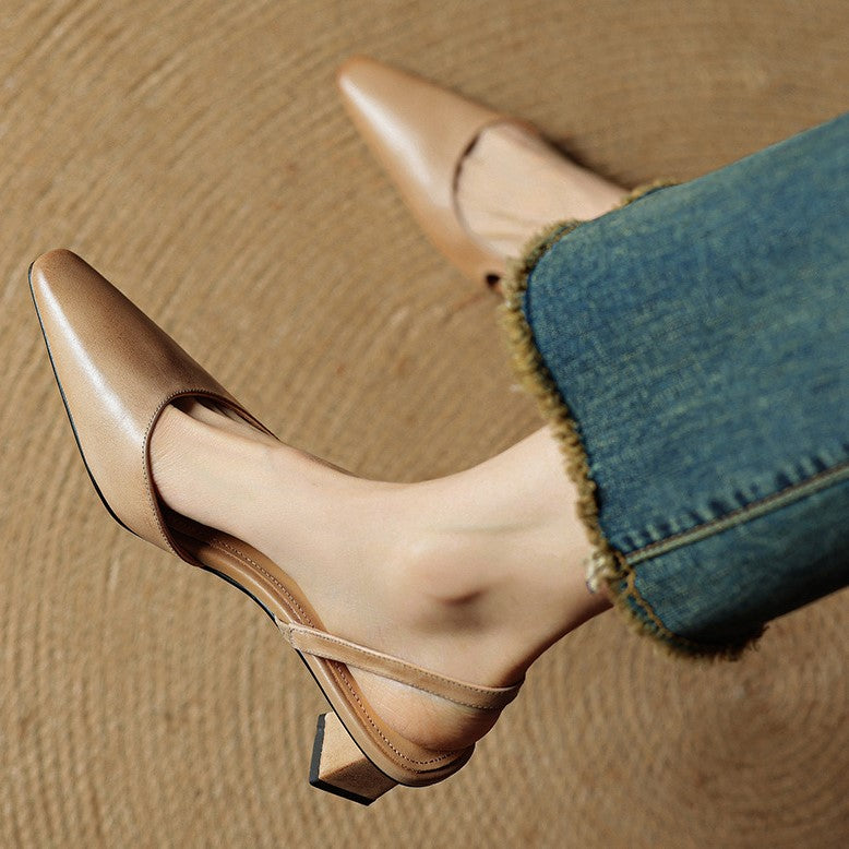 Top-down view of a pointed open-side slingback pump