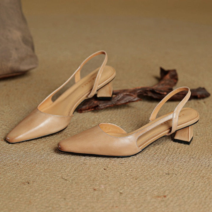 Women's leather slingback pumps shown as a pair