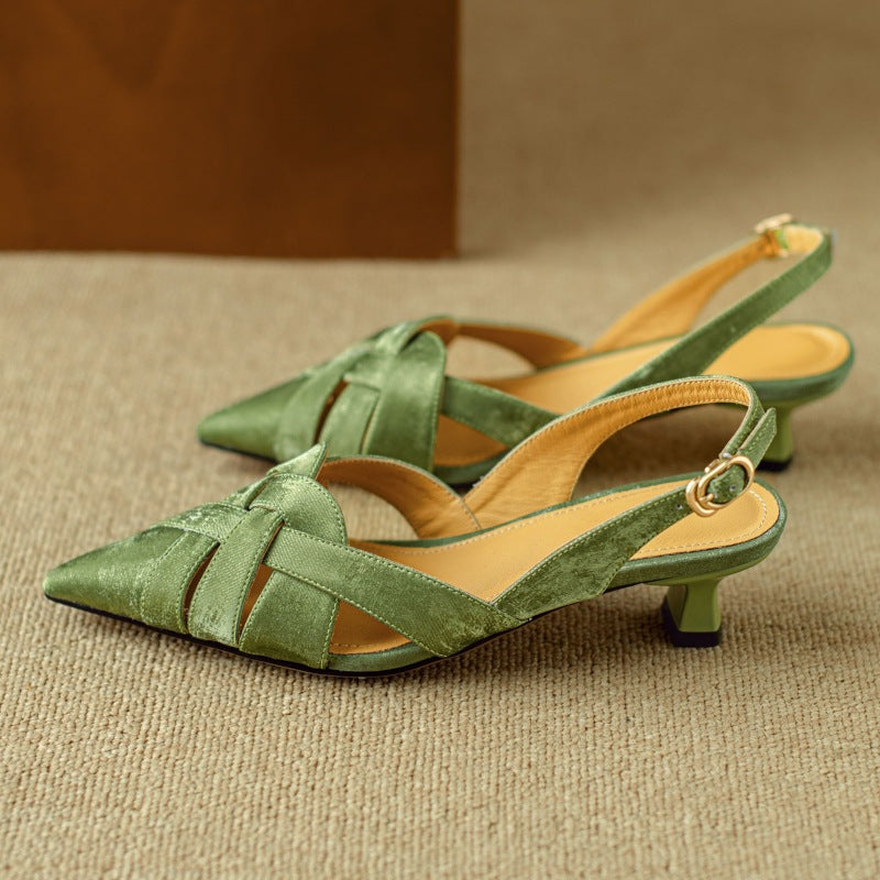Women's woven leather slingback heels shown as a pair