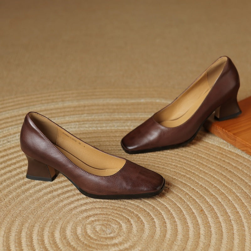 Square-toe flare-heel leather pumps, top view of Espresso Brown pair