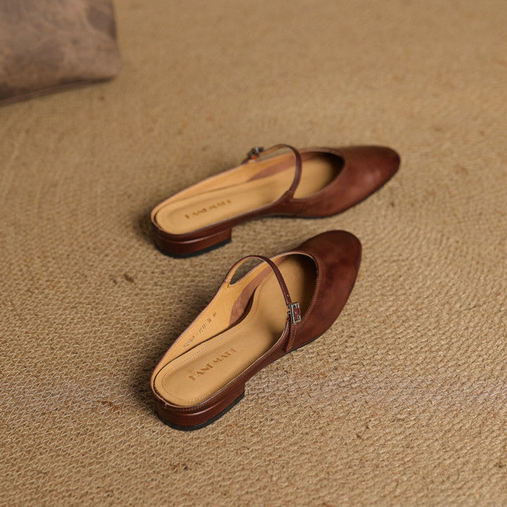 Women's Mary-Jane leather mules shown as a pair