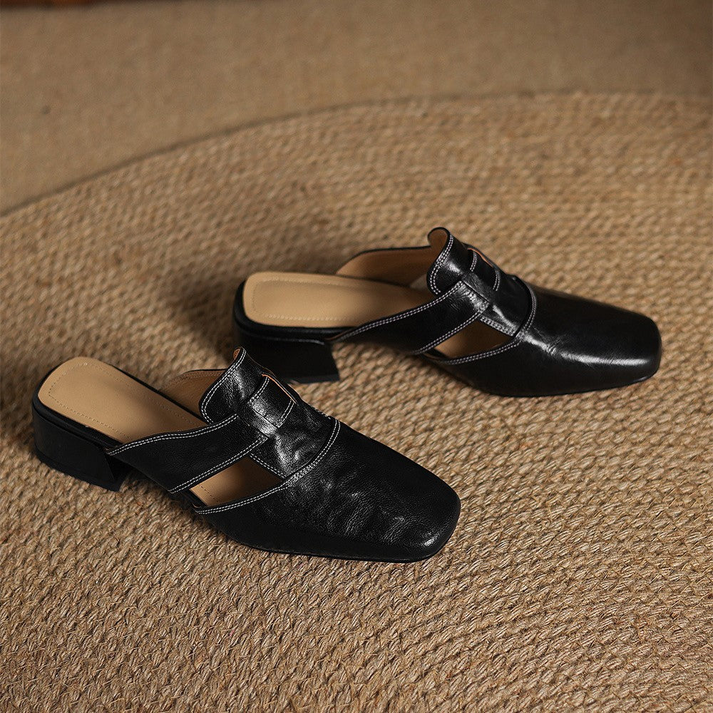 Top-down view of a square-toe leather slip-on mule
