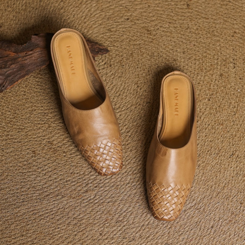 Onyx Black Meredith mules photographed from above