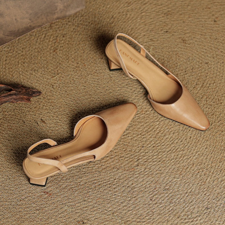 Leather slingback pumps styled with cropped trousers