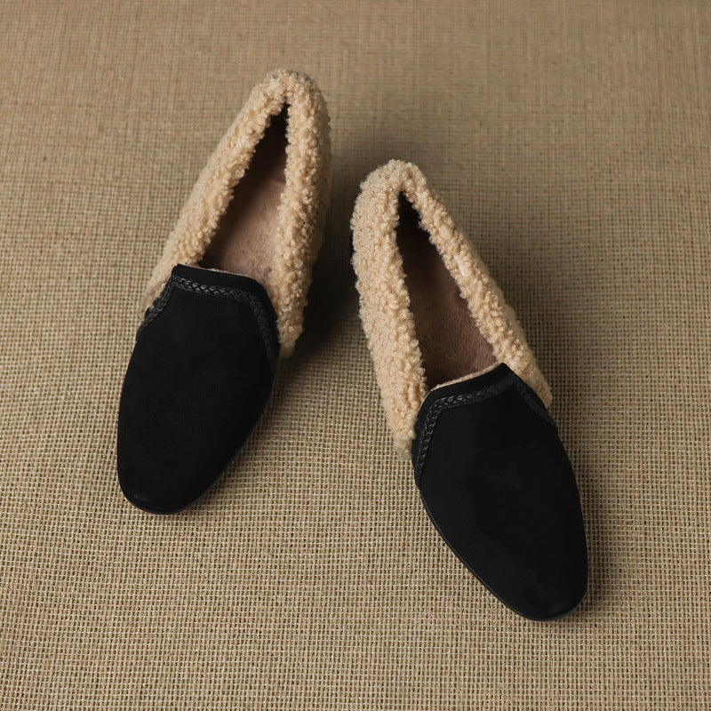 Close-up of block heel on Dolores suede heels