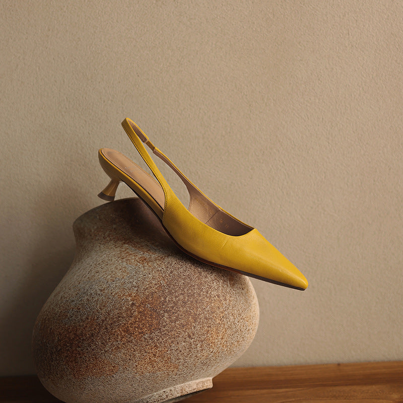 Top-down view of a pointed-toe lambskin slingback