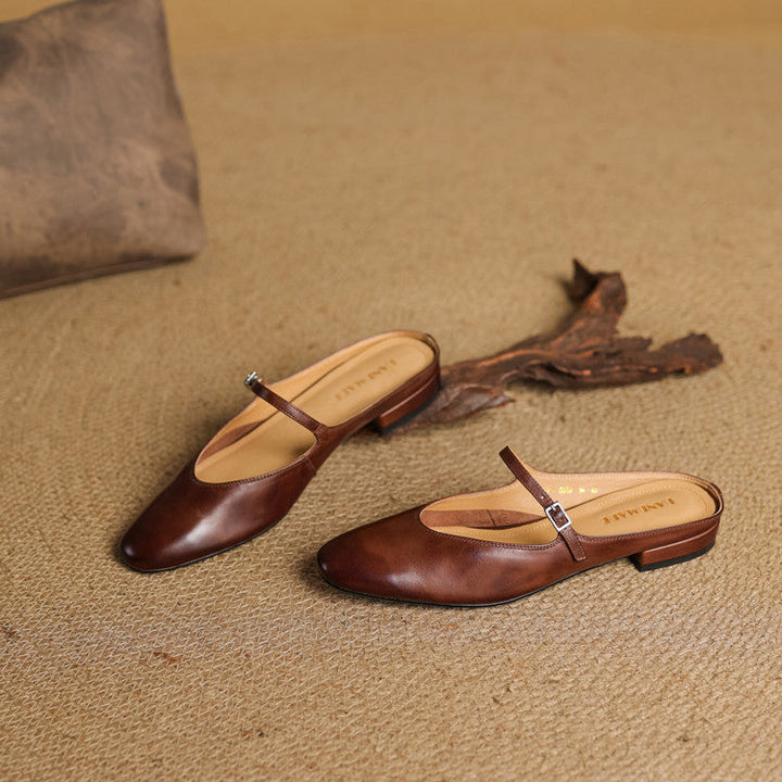 Top-down view of a closed-toe Mary-Jane leather mule