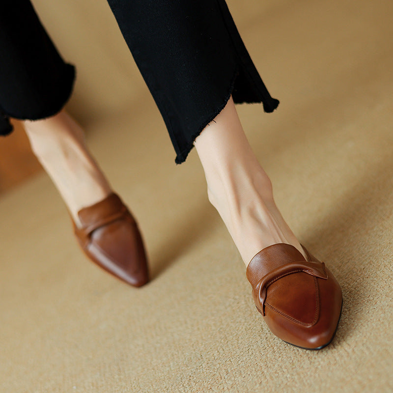 Top-down view of a tapered pointed leather mule