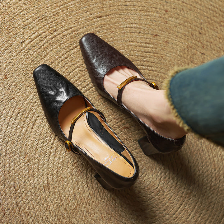 Espresso Brown leather block pumps, angled studio shot
