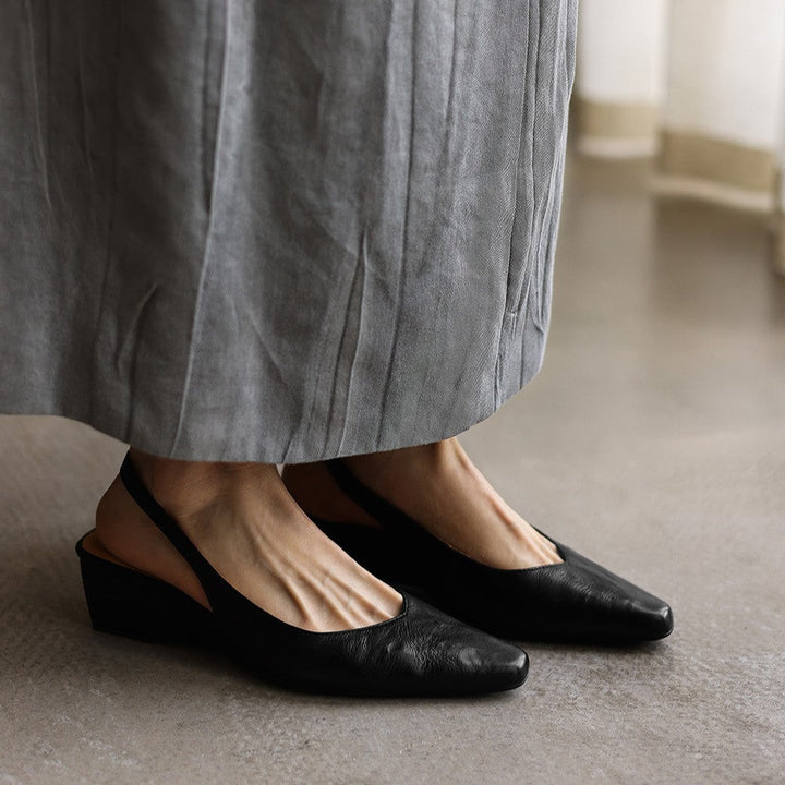 Bordeaux Rouge lambskin wedge slingbacks, angled studio shot