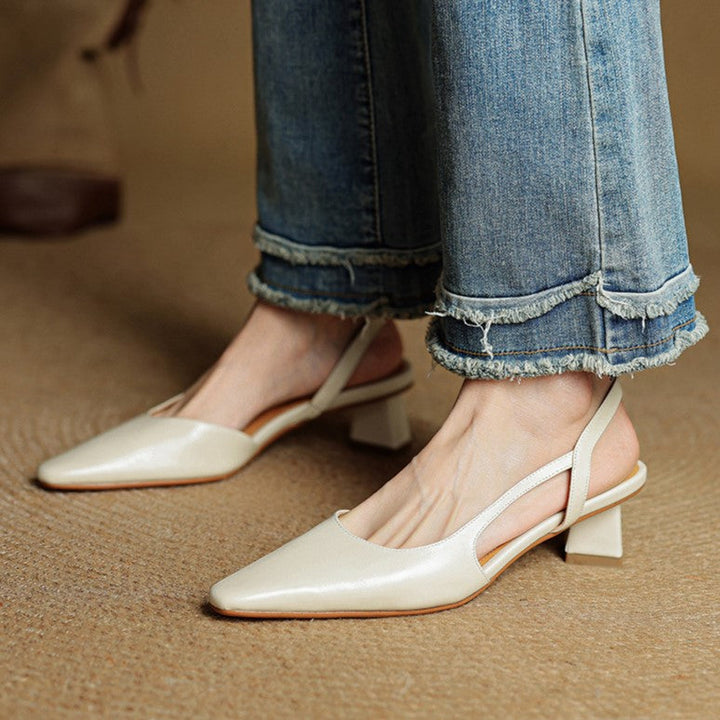 Women's pointed leather slingback pumps, front view