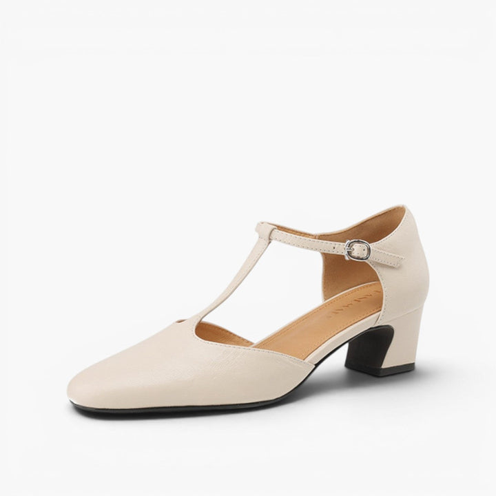 Leather T-strap heels styled with cropped trousers