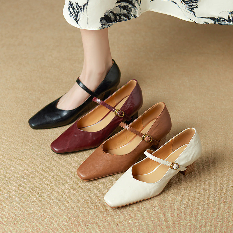 Leather Mary-Jane block pumps, top view of Cognac Tan pair