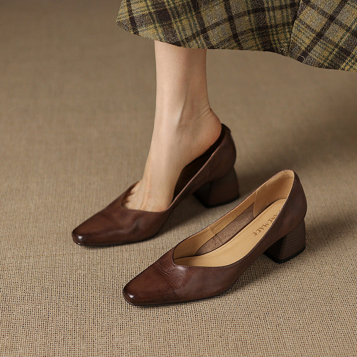 Women's square-toe leather pumps, front view