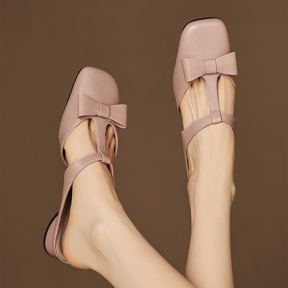 Penelope mules, close-up of sculpted bow detail