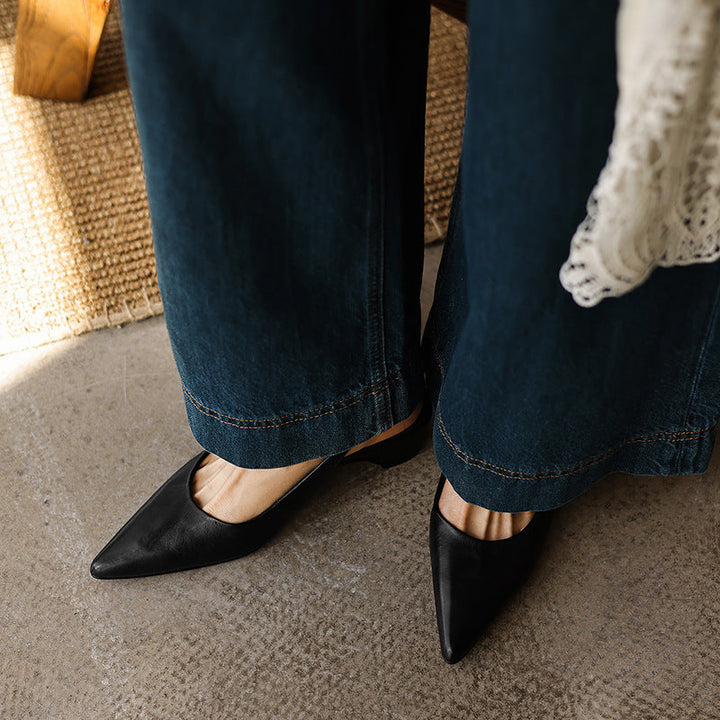 Women's pointed leather slingback heels, front view