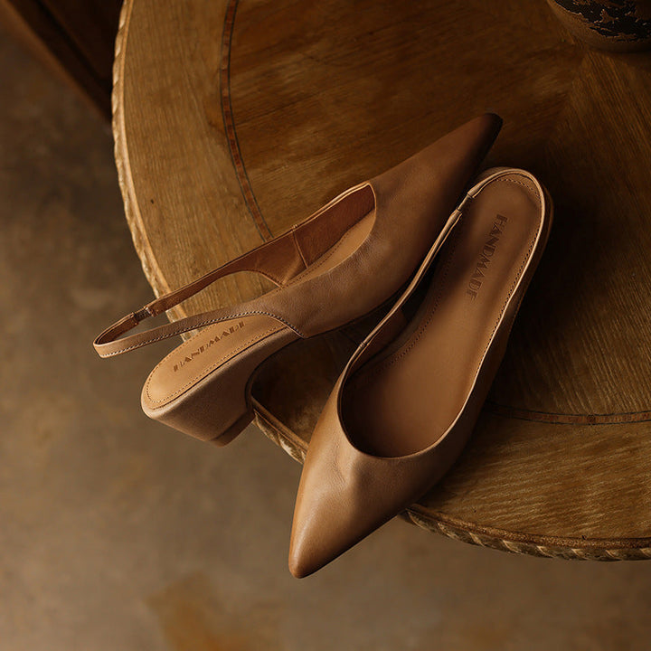 Top-down view of a pointed leather slingback heel