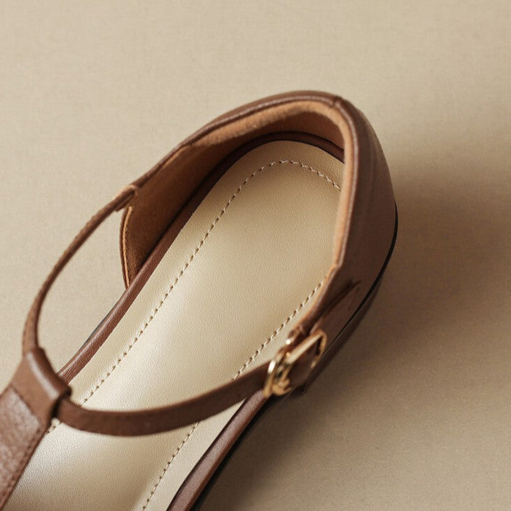 Nude Stone leather T-bar heels, angled studio shot