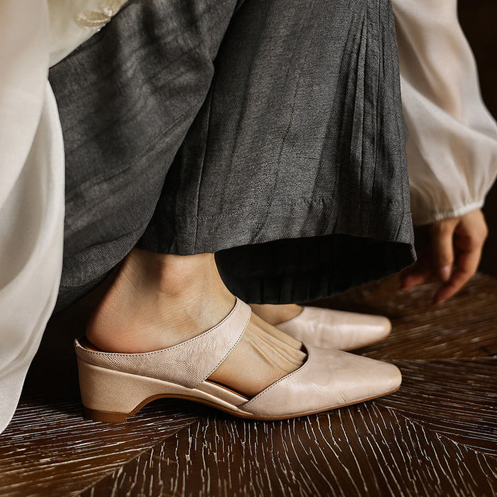 Leather wedge mule back view showing the 2-inch wedge heel