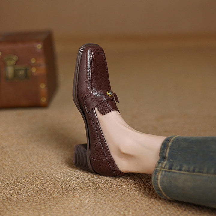 Noir Black leather loafer pump, side view of block heel
