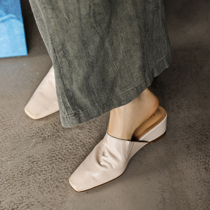 Women's square-toe leather wedge mules, front view